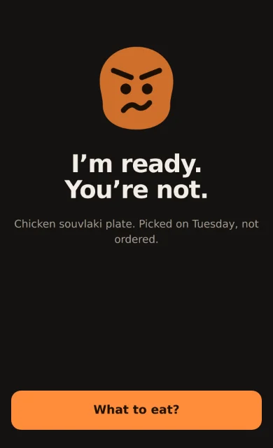 Grumbly's start screen: the mascot, a line about the chicken souvlaki picked on Tuesday and not ordered, and the What to eat? button
